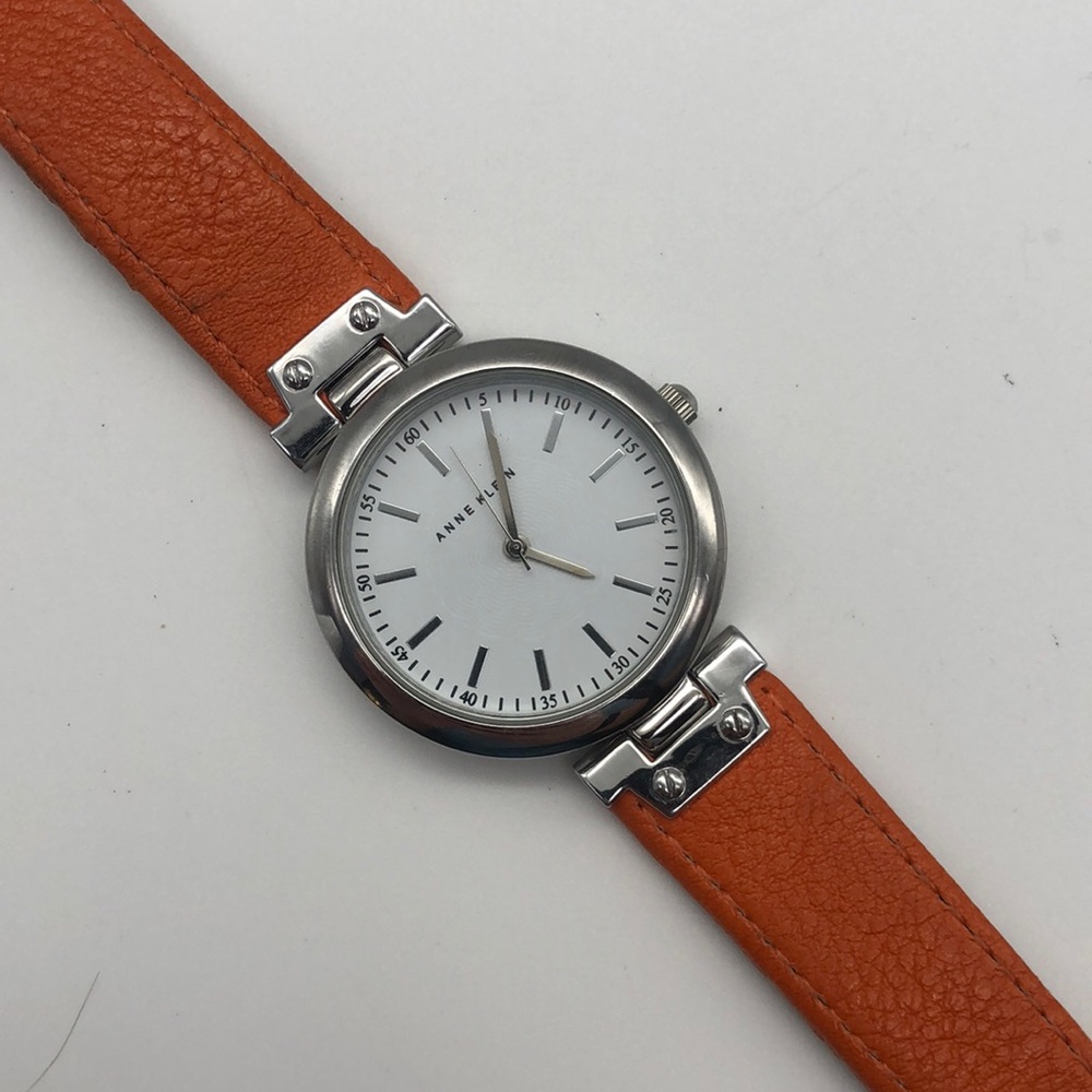 ANNE KLEIN SILVER TONE,ORANGE LEATHER BACKING WATCH AK/1647 New Battery Working